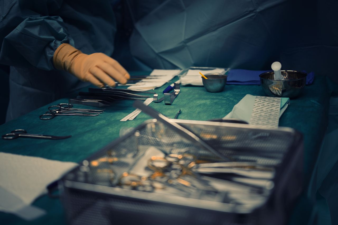 Close-up of surgical instruments prepared for surgery in a hospital operating room.